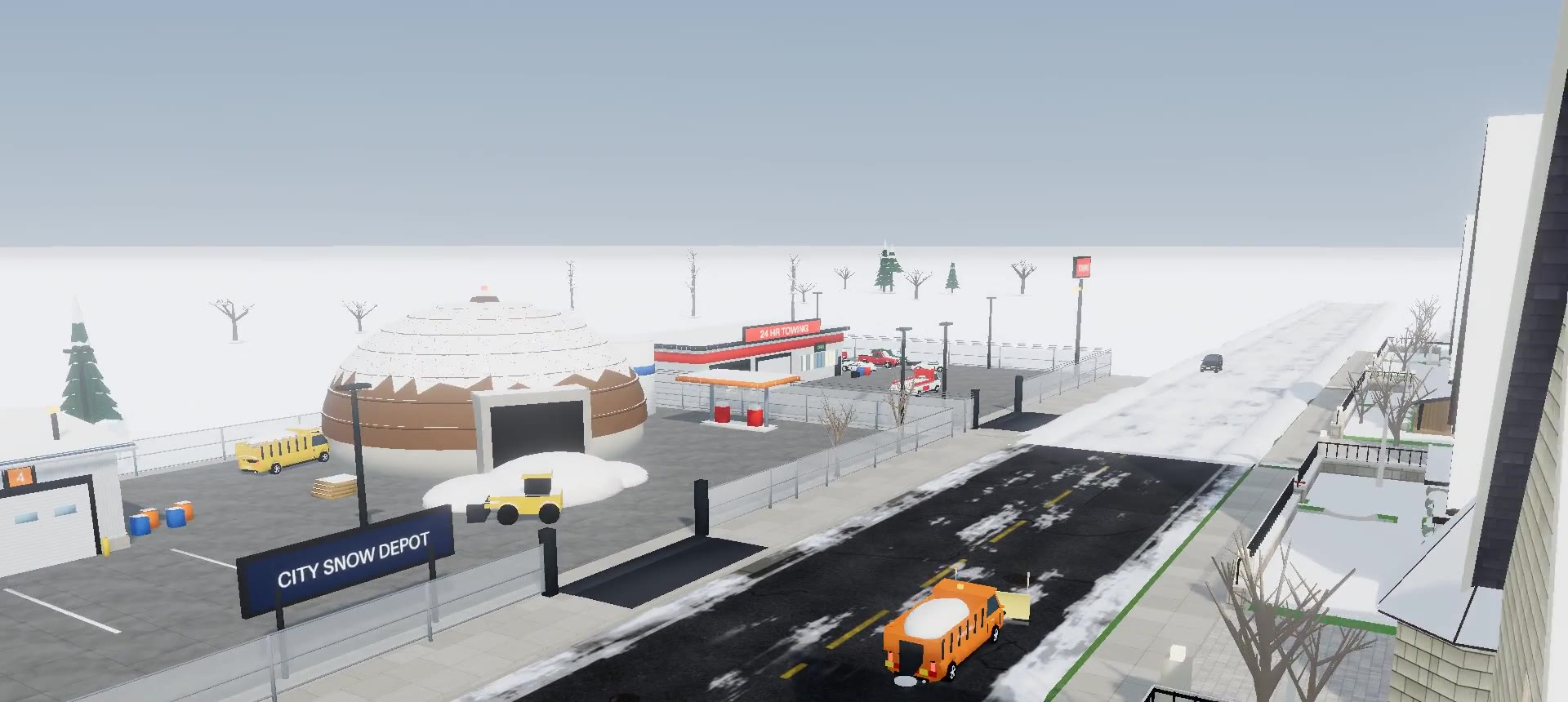 A snow plough clearing a road by the public works depot
