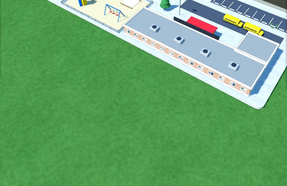 An elementary school with a playground and school buses