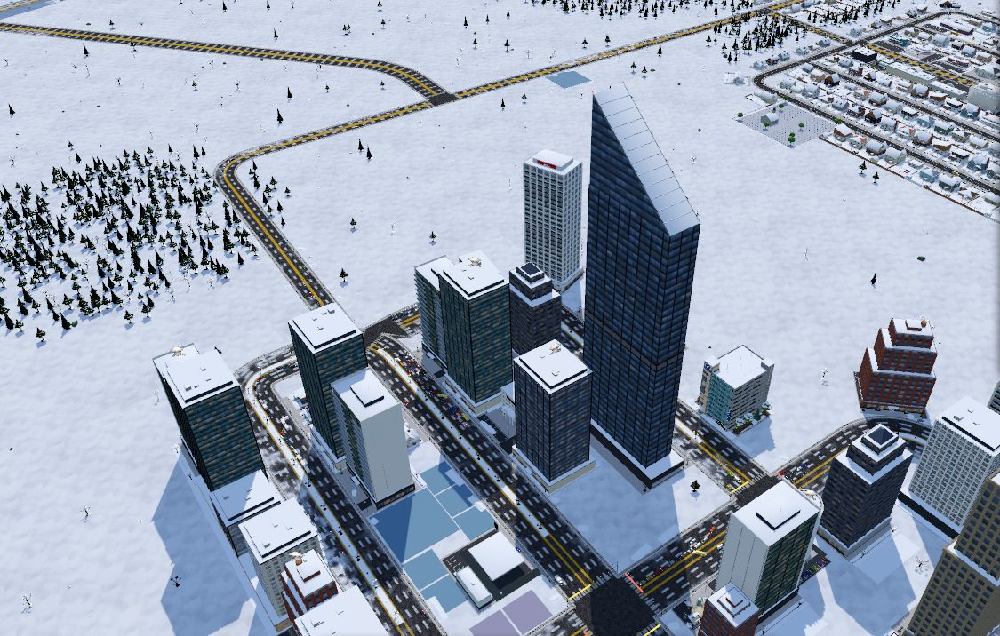 Downtown towers in winter in The City, with snowy low density neighbourhoods in the distance